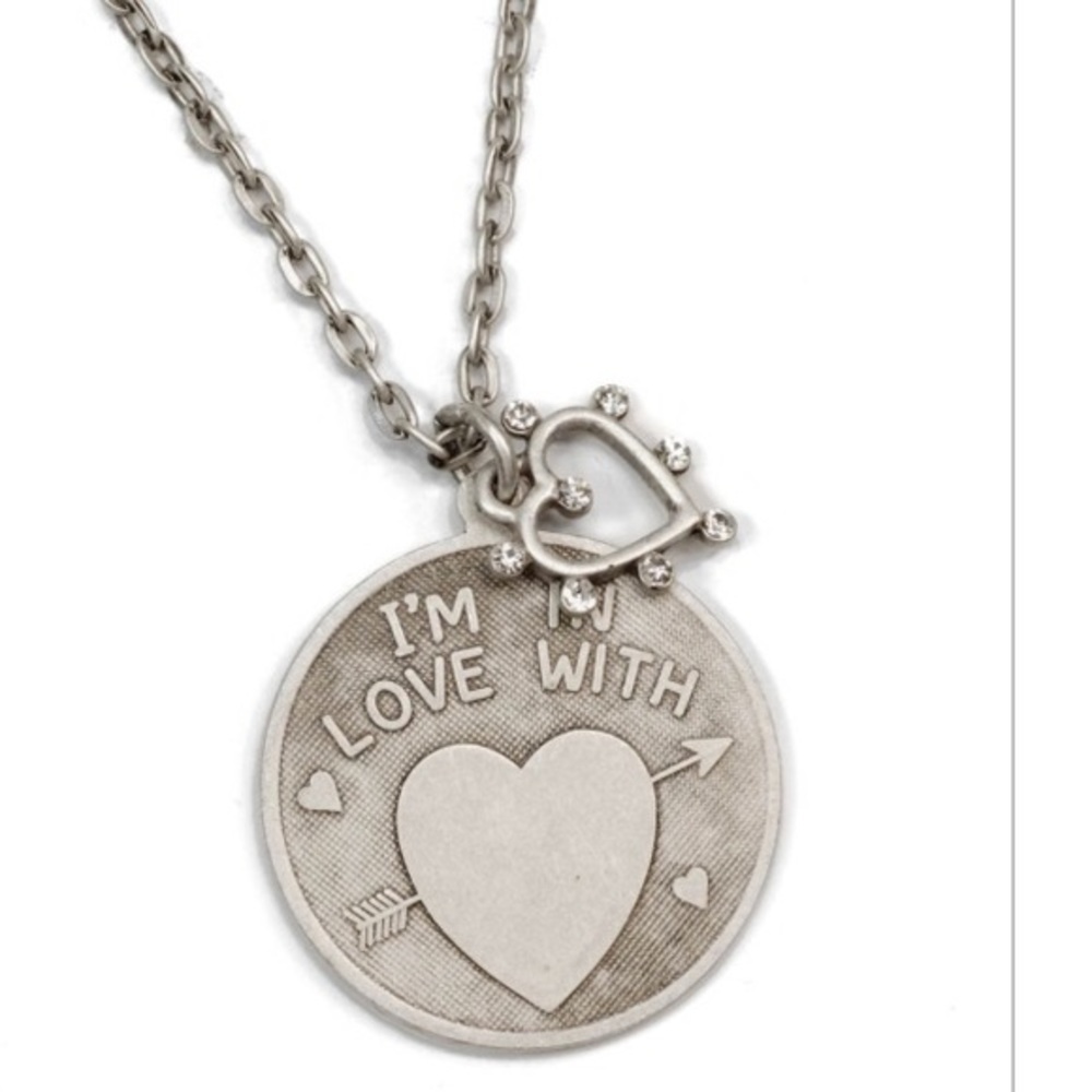 I'm in love with.... Silver metal necklace